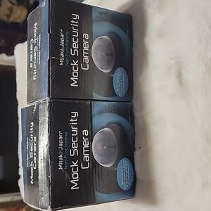 SET OF 2 - TOTAL.  NEW IN BOXES AND BUBBLE WRAP.  MOCK SECURITY CAMERAS.